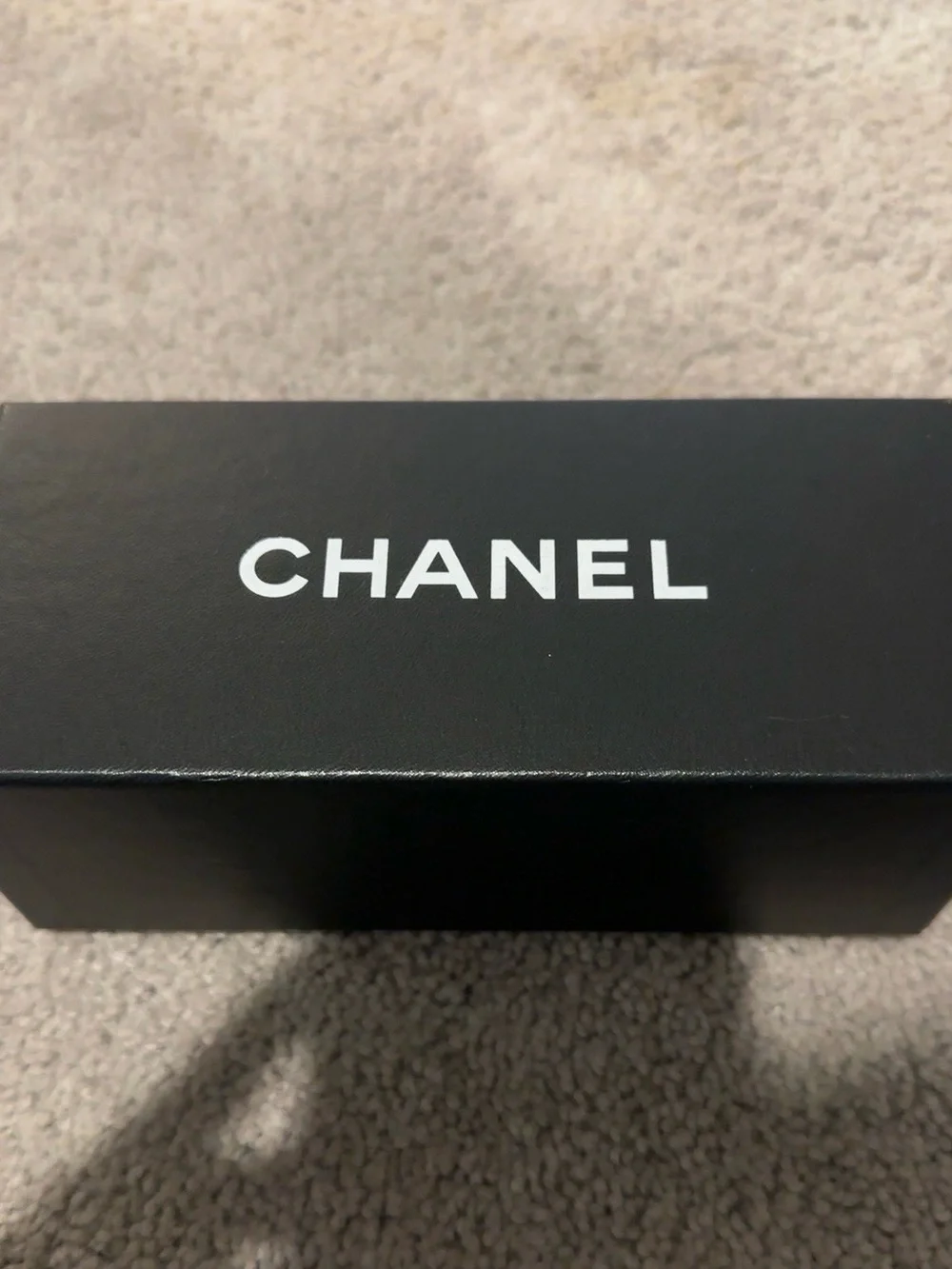CHANEL Black Cat-Eye Sunglasses with Gold Accent